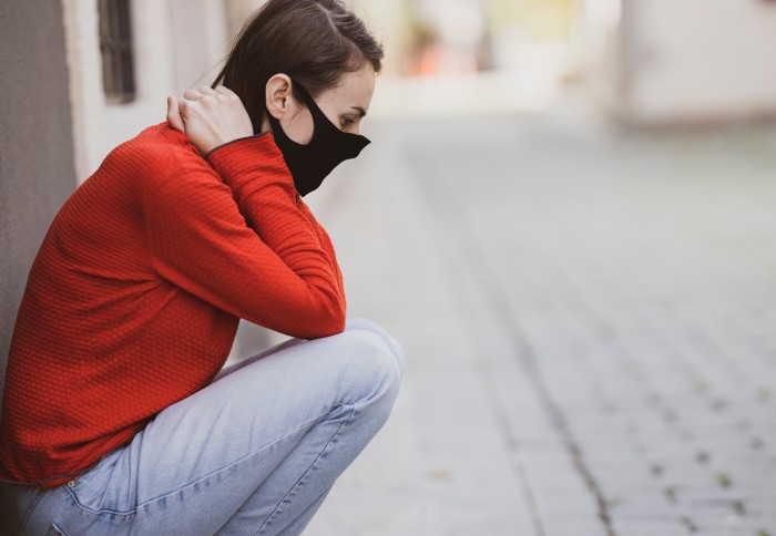 Woman kneeling down