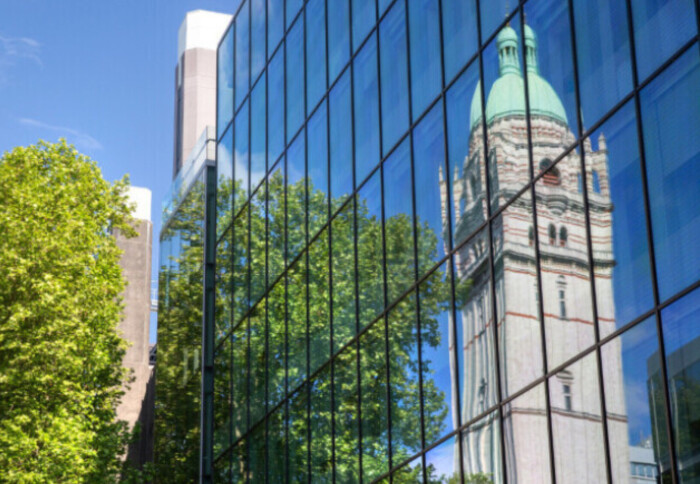 Reflection of Queens Tower on building
