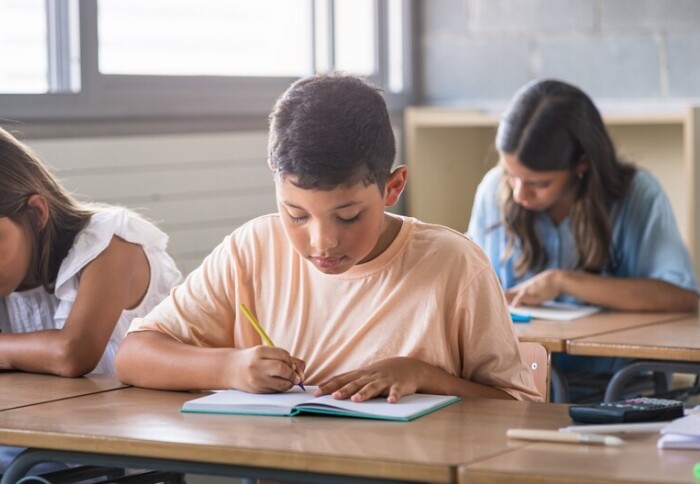 Stock image of children studying