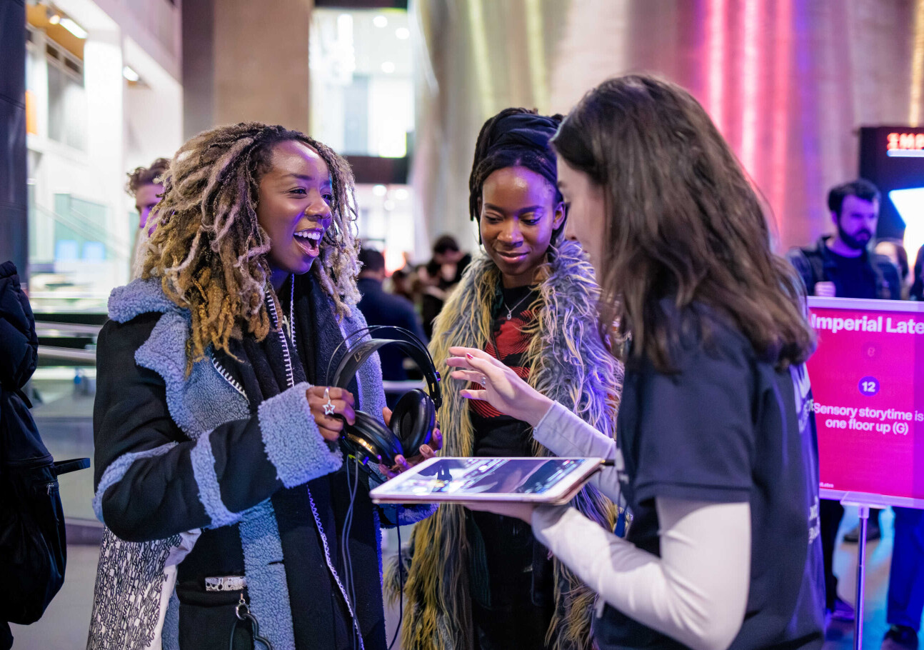 Imperial researcher speaking with Lates visitors